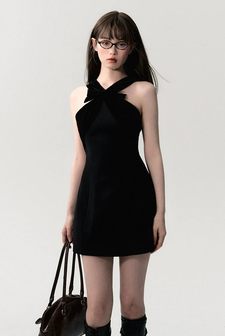 Sleeveless Mini Dress with Velvet Crisscross Neckline and Bow Detail
