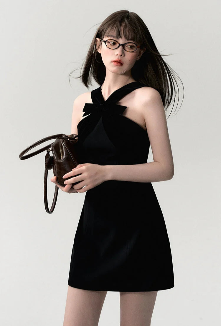 Sleeveless Mini Dress with Velvet Crisscross Neckline and Bow Detail